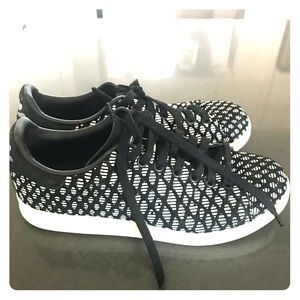 Black and white Stan Smiths